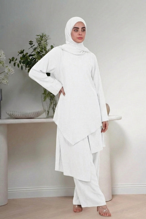 Charger l'image 1 dans la vue galerie. Haroof Two Piece Set in White - Detail view - Arabic calligraphy architectural design - AWAASHI Premier modest fashion
