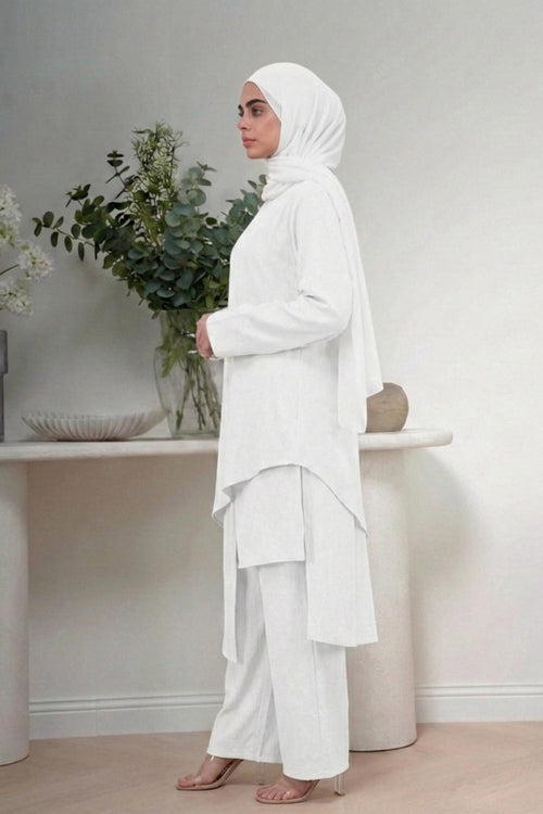 Charger l'image 1 dans la vue galerie. Haroof Two Piece Set in White - Side view - Arabic calligraphy architectural design - AWAASHI Premier modest fashion
